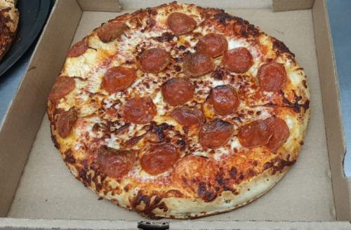 Pepperoni Pizza 12.50, slice 3.75, Supreme Pizza 13.50