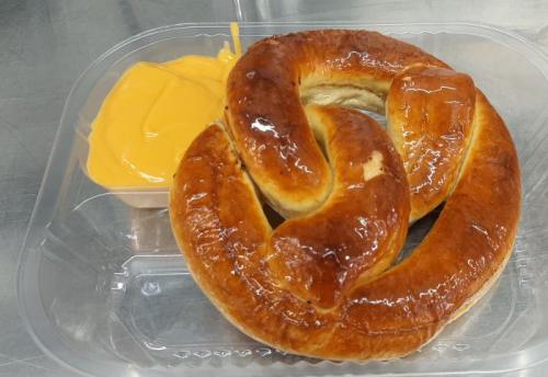 Hot oven baked pretzel w/ cheese 7.25